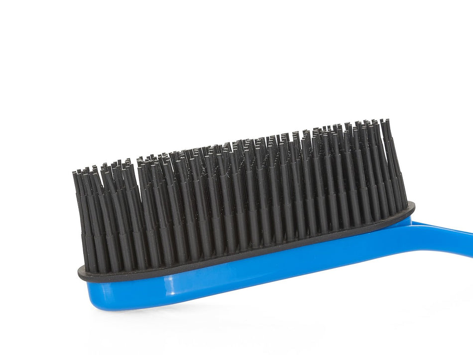 Rubberen bezem met blik